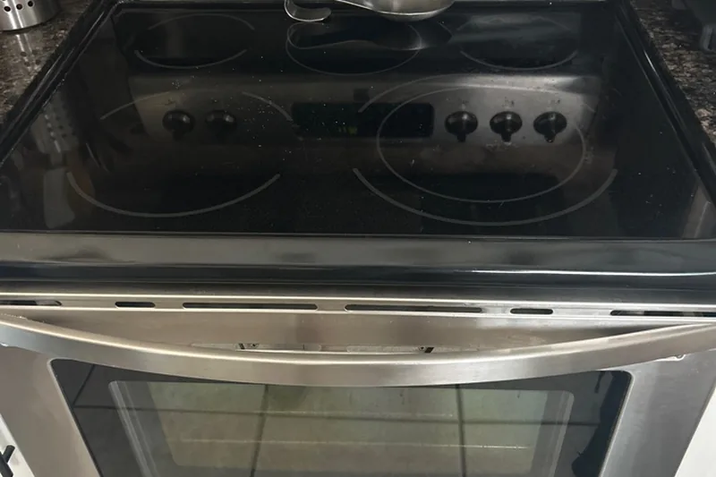 Orland Park, IL range and oven repair - ceramic glass cooktop, convection element, and precision temperature sensor calibration